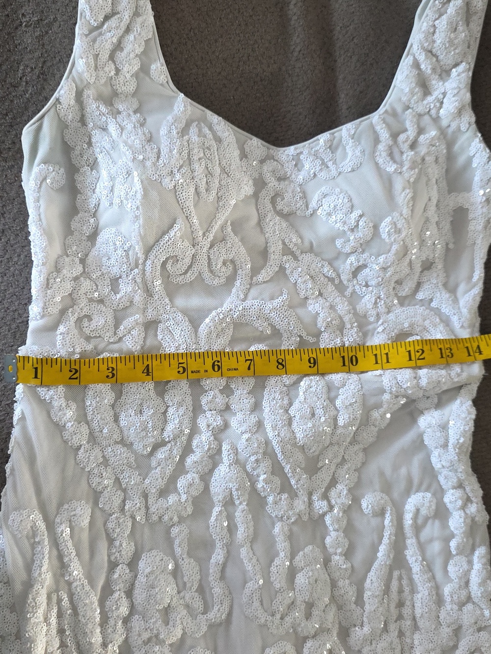 Elegant White Beaded Sleeveless Evening Gown - Picture 9 of 9
